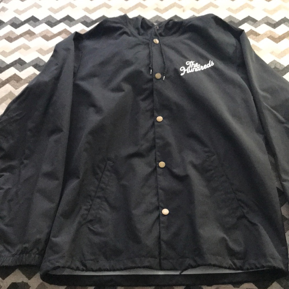 Black windbreaker